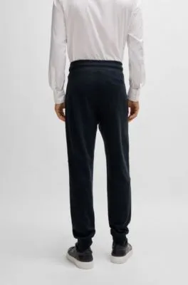 Regular-fit tracksuit bottoms in stretch flannel