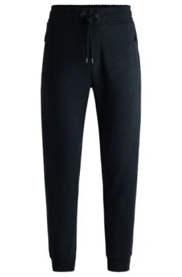 Regular-fit tracksuit bottoms in stretch flannel